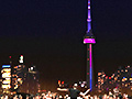 Toronto's CN Tower lights up in response to the Toronto Symphony Orchestra